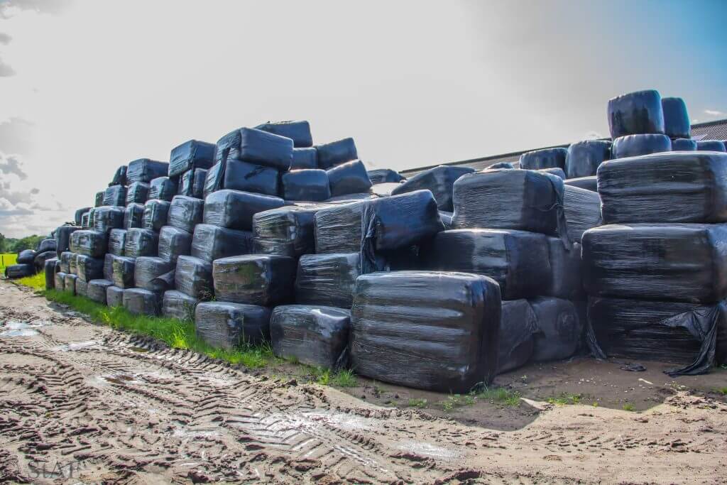 Bevatten Opsplitsen Blauwe plek Verkoop - Zand, stro, hooi, houtsnippers, bestrating - Loonbedrijf Nijboer